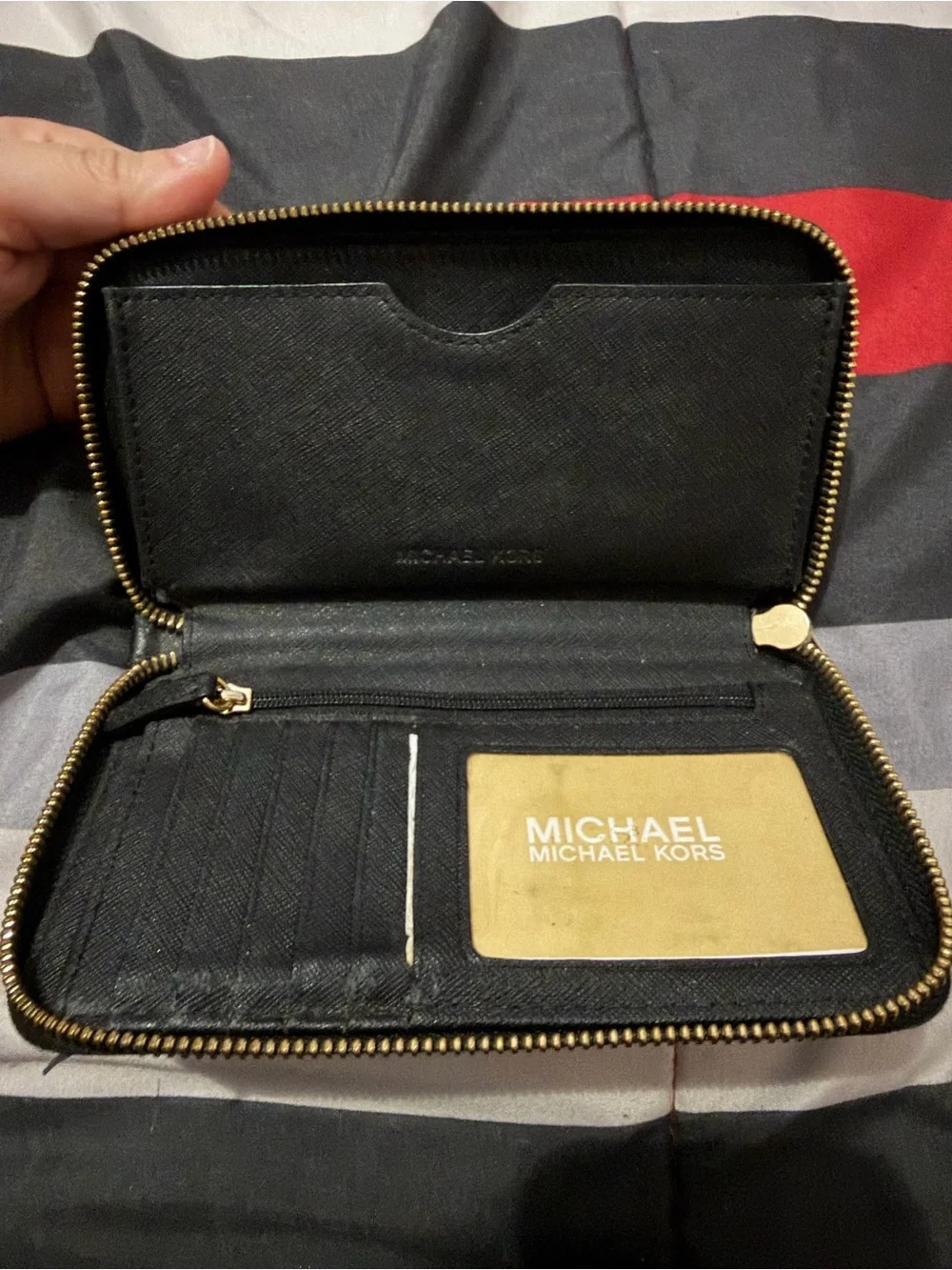 Michael Kors Black Zip Around Saffiano Wallet with Gold Logo